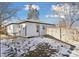 View of the back of the house and a fenced backyard at 1130 Oak Pl, Thornton, CO 80229