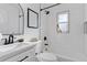 Clean bathroom with subway tile and black accents at 1130 Oak Pl, Thornton, CO 80229