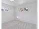 Spacious bedroom with light gray carpet and neutral walls at 1130 Oak Pl, Thornton, CO 80229