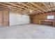 Spacious garage interior with ample storage space at 1130 Oak Pl, Thornton, CO 80229