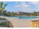 Large community swimming pool featuring clear blue water and surrounding lounge area for relaxation at 11103 Cloud Shadow St, Littleton, CO 80125