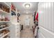Large closet with custom shelving and drawers for ample storage space at 3577 S Hillcrest Dr, Denver, CO 80237