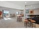 Finished basement with walkout access, wet bar, pool table and seating with mountain view at 10531 Lieter Pl, Lone Tree, CO 80124