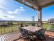 Deck with dining table, chairs, and amazing mountain views at 10531 Lieter Pl, Lone Tree, CO 80124