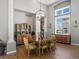 Dining room with elegant furniture and a large window at 10531 Lieter Pl, Lone Tree, CO 80124