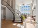 Spacious foyer with a grand staircase and lots of natural light at 10531 Lieter Pl, Lone Tree, CO 80124