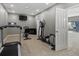 Home gym features a treadmill, elliptical, and stationary bike at 10531 Lieter Pl, Lone Tree, CO 80124