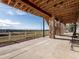 Covered patio area with stone pillars and mountain views at 10531 Lieter Pl, Lone Tree, CO 80124