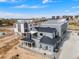 New construction home with an outdoor porch with a fireplace and a rooftop terrace at 888 S Valentia St # 106, Denver, CO 80247