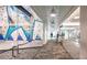 Contemporary hallway with a large climbing wall feature and modern lighting at 888 S Valentia St # 106, Denver, CO 80247