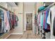 Walk-in closet with ample storage and easy access to other areas of the home at 31200 E 145Th Ave, Brighton, CO 80603