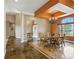 Elegant dining room showcasing stylish lighting and large windows with lovely outdoor views at 31200 E 145Th Ave, Brighton, CO 80603
