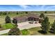 Stunning ranch style home with a three car garage, fountain and circular driveway at 31200 E 145Th Ave, Brighton, CO 80603
