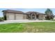 Charming brick home with a well manicured lawn, three car garage, and lovely landscaping at 31200 E 145Th Ave, Brighton, CO 80603