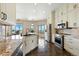 Modern kitchen featuring granite countertops, stainless steel appliances, and bright lighting at 31200 E 145Th Ave, Brighton, CO 80603