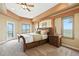 Comfortable main bedroom with great views and a door leading to a private outdoor space at 31200 E 145Th Ave, Brighton, CO 80603
