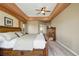 Spacious main bedroom with tray ceilings and large windows offers natural light and comfort at 31200 E 145Th Ave, Brighton, CO 80603