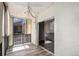 Cozy balcony with wood-look flooring and sliding glass door access at 3460 S Poplar St # 404, Denver, CO 80224