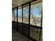 Relax on the screened balcony with a view, perfect for enjoying the outdoors year-round at 3460 S Poplar St # 404, Denver, CO 80224