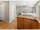 Kitchen with granite countertop island adjacent to dining area at 2548 Foothills Canyon Ct, Highlands Ranch, CO 80129
