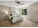 Bedroom with ceiling fan and plenty of natural light from a window overlooking the yard at 2548 Foothills Canyon Ct, Highlands Ranch, CO 80129