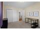 Cozy bedroom with closet, en-suite bath, carpet flooring and dark wood accents at 1581 S Kendall St, Lakewood, CO 80232