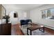 Stylish living room with hardwood floors and comfortable seating area at 1581 S Kendall St, Lakewood, CO 80232