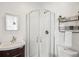 Bathroom with stand up shower and vanity at 1860 W Iris Cir, Littleton, CO 80120