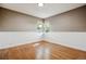 Bedroom with hardwood floors and natural light at 1860 W Iris Cir, Littleton, CO 80120