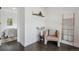 Hallway with decorative accents leading to a bedroom at 1860 W Iris Cir, Littleton, CO 80120