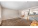 Spacious living room with a dining area that has a staircase in view at 12289 W Dakota Dr, Lakewood, CO 80228
