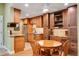 Well-appointed kitchen with stainless steel appliances, granite countertops, and ample cabinet space at 8225 Fairmount Dr # 10-203, Denver, CO 80247