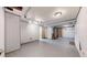 Finished basement features durable flooring, paneled walls, and access to other areas at 921 S Wheeling St, Aurora, CO 80012