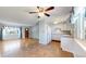 Open floor plan with kitchen and living room, connecting the spaces at 921 S Wheeling St, Aurora, CO 80012