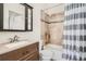 Bathroom with tiled shower and tub, and vanity sink at 9640 W Chatfield Ave # F, Littleton, CO 80128