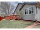 Charming backyard features a spacious deck and lush green lawn, perfect for outdoor enjoyment at 16397 Sheridan Dr, Parker, CO 80134