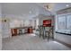 Spacious finished basement features a built-in bar, window seats, and ample lighting at 16397 Sheridan Dr, Parker, CO 80134