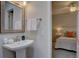 Tastefully decorated bathroom featuring a pedestal sink at 16397 Sheridan Dr, Parker, CO 80134