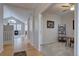 Inviting foyer with hardwood floors leading to living spaces, enhancing the home's open layout at 16397 Sheridan Dr, Parker, CO 80134