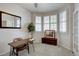 Bright home office featuring natural light, modern desk, and stylish decor for a productive workspace at 16397 Sheridan Dr, Parker, CO 80134