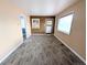 Cozy living room featuring new floors and ample natural light at 2696 S Grove St, Denver, CO 80219