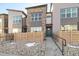 Charming two-story townhome with stone accents and landscaping at 9445 W 58Th Cir # C, Arvada, CO 80002