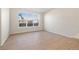 Bright living room featuring a large window and wood-look flooring at 9445 W 58Th Cir # C, Arvada, CO 80002