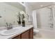 Clean bathroom with a sink, vanity, and shower-tub combination at 1998 Coach House Loop, Castle Rock, CO 80109