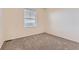 Comfortable bedroom with neutral carpet and a bright window at 1998 Coach House Loop, Castle Rock, CO 80109