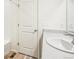 Clean bathroom with a single sink vanity, shower, and a linen closet at 13432 E 110Th Way, Commerce City, CO 80022
