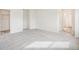 Spacious bedroom with walk-in closet and neutral carpeting at 13432 E 110Th Way, Commerce City, CO 80022