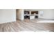 Open concept kitchen with island and dark cabinets at 13432 E 110Th Way, Commerce City, CO 80022