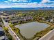 Picturesque aerial view of a lake community with stunning mountain views in the background at 4385 S Balsam St # 10-103, Littleton, CO 80123