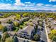 Overhead view of a residential area with lush trees and well-maintained apartment buildings at 4385 S Balsam St # 10-103, Littleton, CO 80123